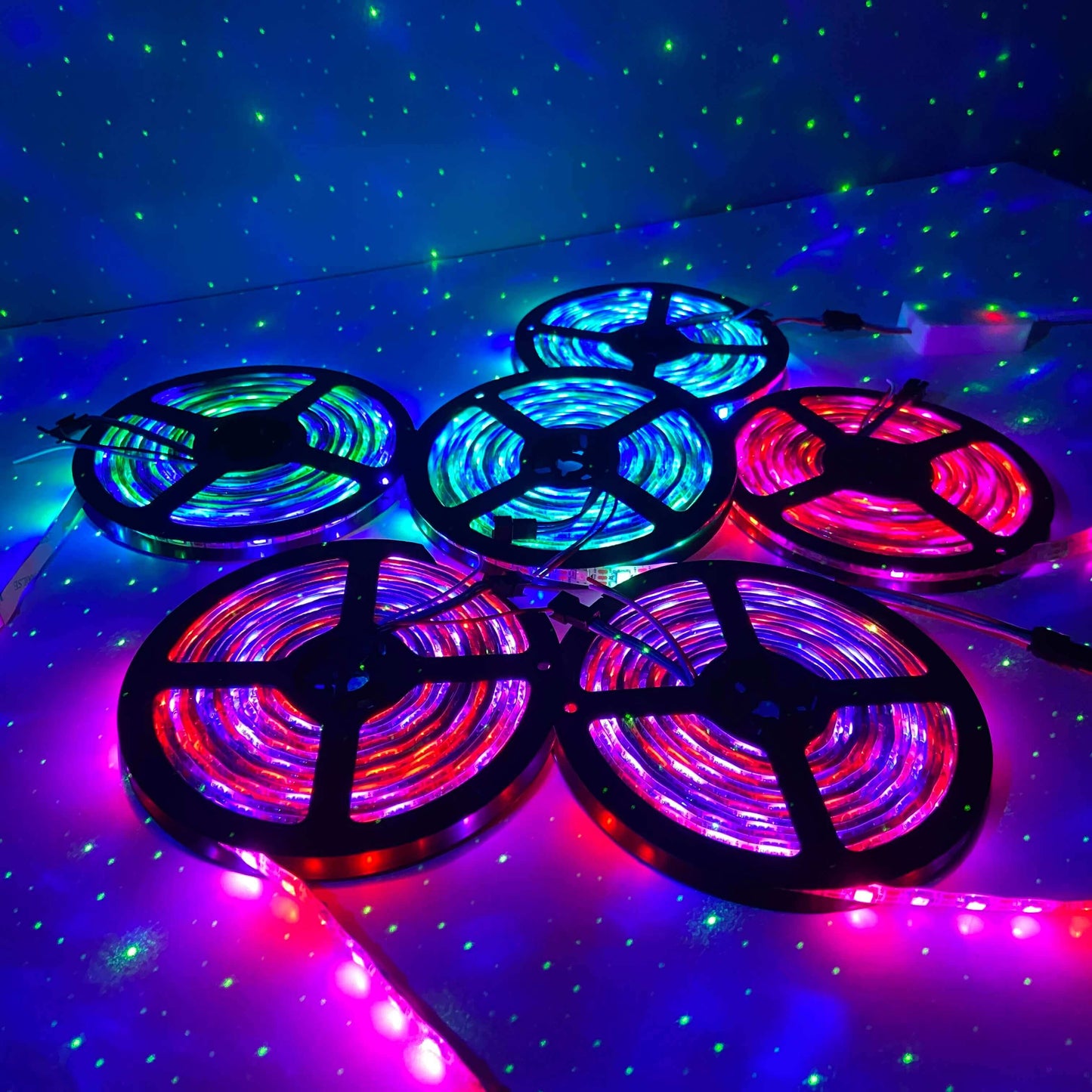 6 led strips on a table lit with the amazing effects from vitaleds